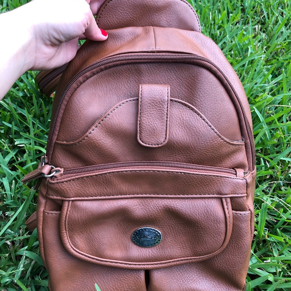 MultiSac brown leather backpack bag